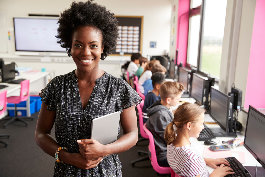 Portrait of Female Teacher Holding Digital Tablet Teaching Line